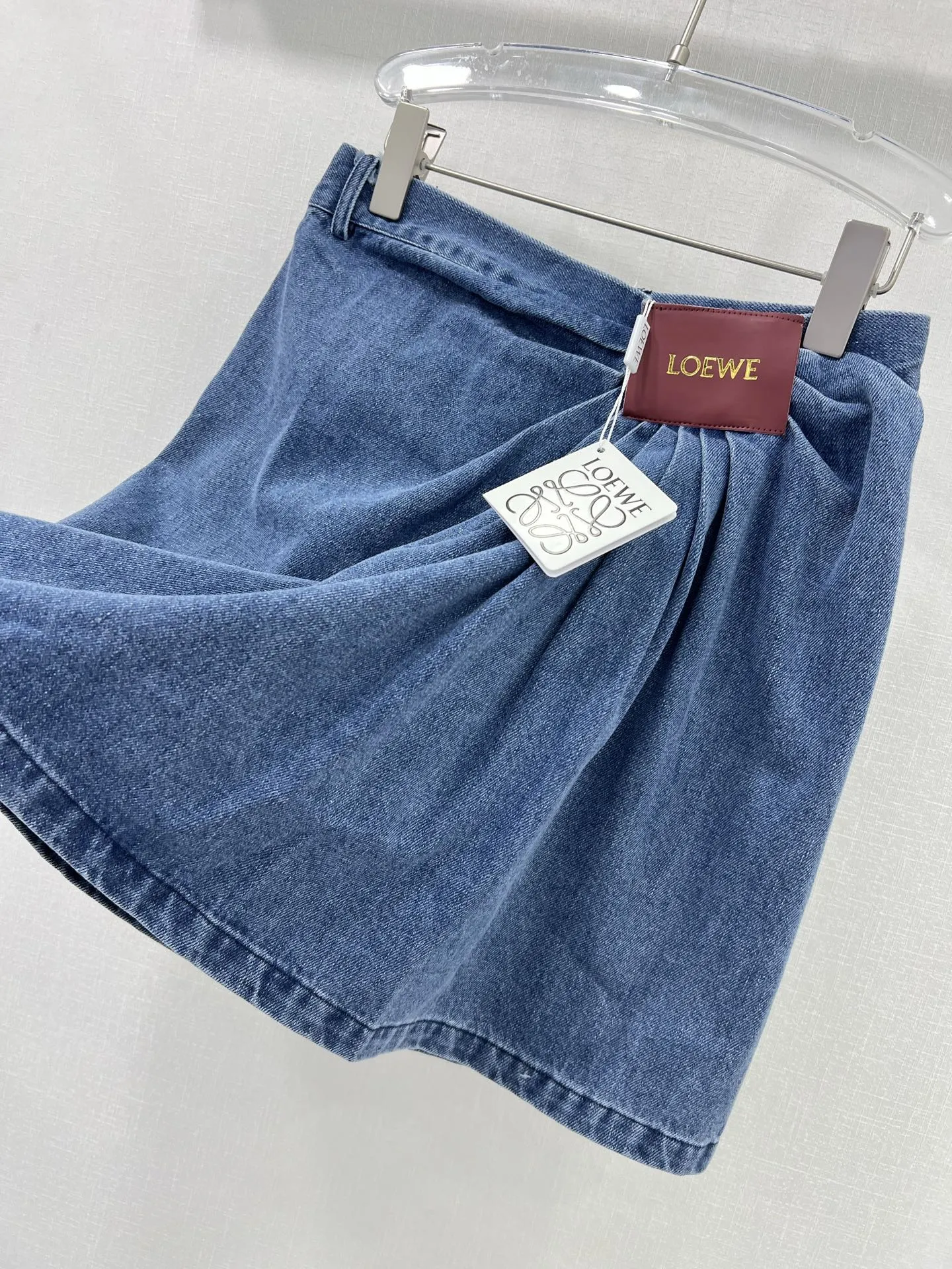 LE 25 new irregular denim skirt