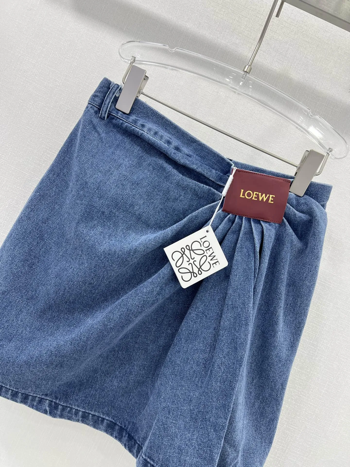 LE 25 new irregular denim skirt