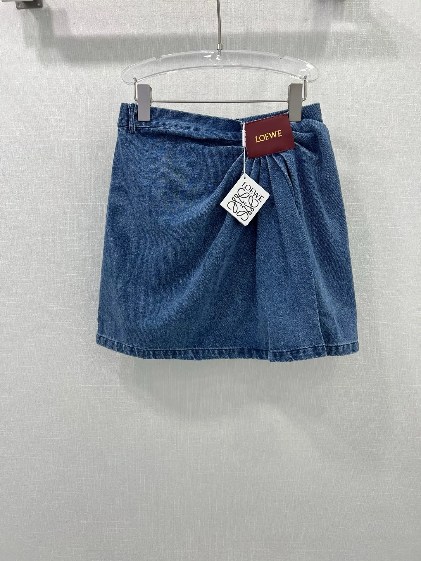 LE 25 new irregular denim skirt